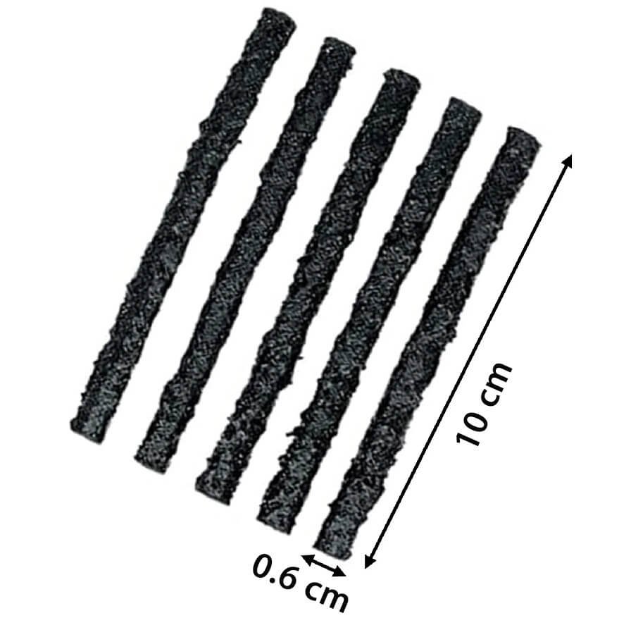 Close up of black tubeless tire repair strings for auto puncture repair
